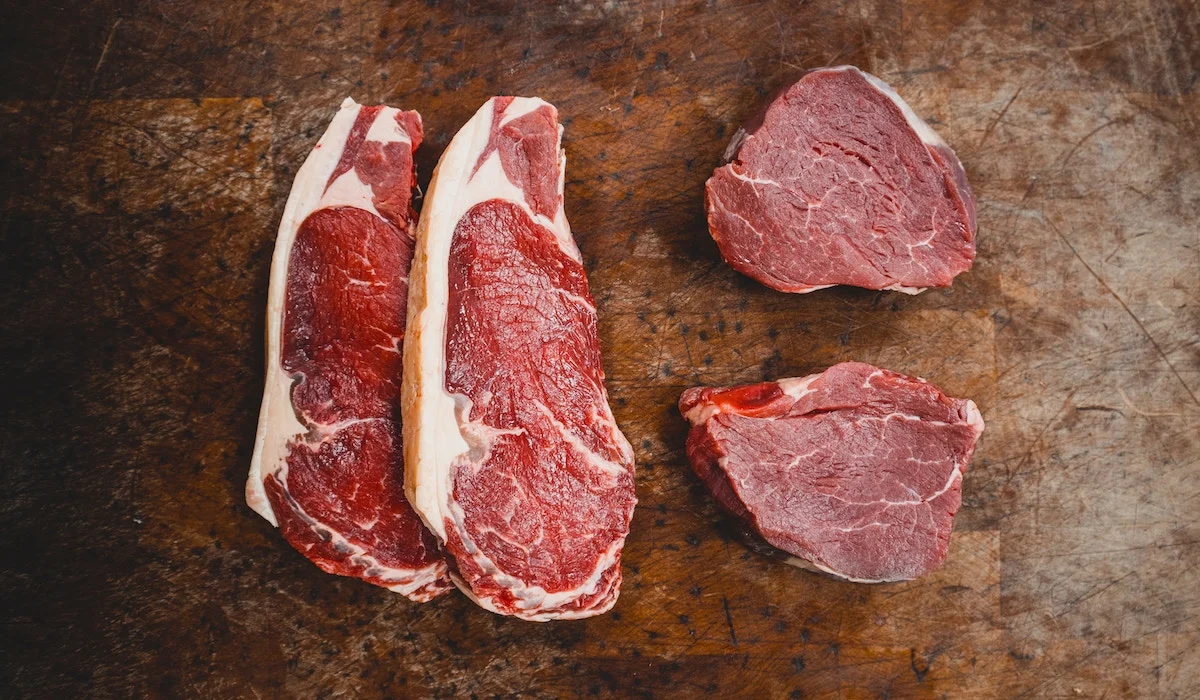 Image of steaks on a cutting board.